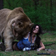 Illustration for article titled Lara Croft Cosplayer Poses With Actual, Giant Bear